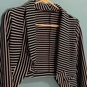 A black and white stripped sweater